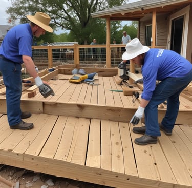 Deck being restructured new wood going over old with men in hats with Bgk handy services on the hats