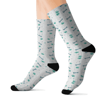Stay cozy and stylish with these Sublimation Socks featuring a cute dog paw and dog bone print.