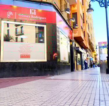 a person walking down a sidewalk with a sign that says goers are not allowed