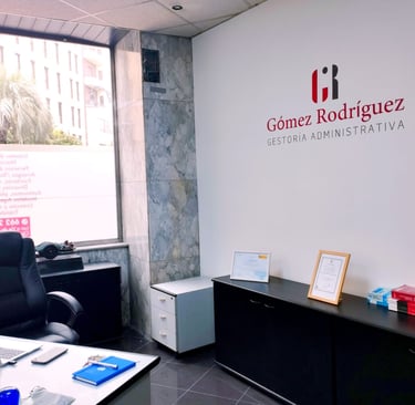 a desk with a laptop and a laptop on it