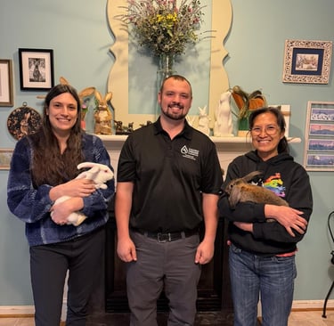Brandon with Friends of Rabbits staff Sarah and Susan