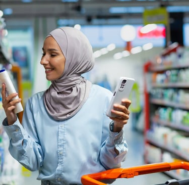young woman chooses FMCG product from the shelf representating Market Entry