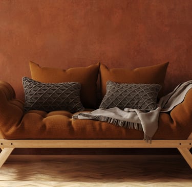 a couch with pillows and pillows in a room