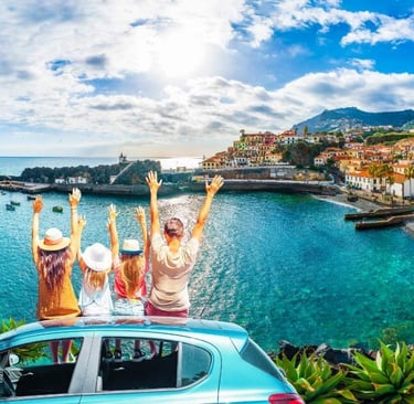 Family on a summer road trip overlooking Camara de Lobos coastal village in Madeira, Portugal.
