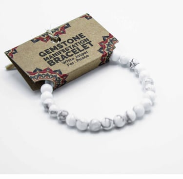 a bracelet bracelet with a white marbled bead