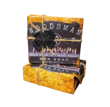 a stack of soap bars with a rustic background