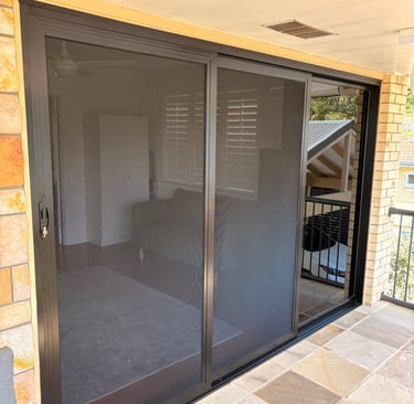 Sliding door with security screens