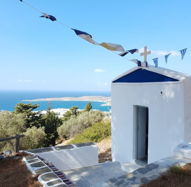 a chapel on a hill overlooking the sea