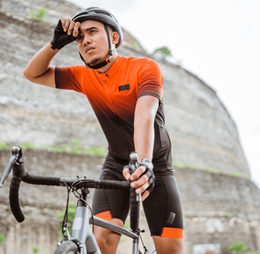 Cyclist showing increased discomfort as ride duration increases due to poor bike fit