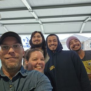 Happy customers with a smiling Swift Movers crew – highlighting our professional team and consistent
