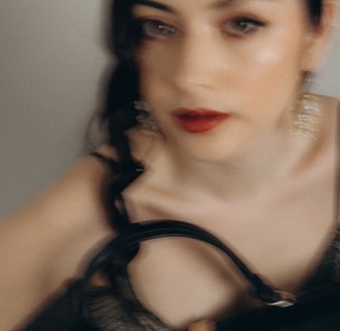 a woman with a purse and a black purse