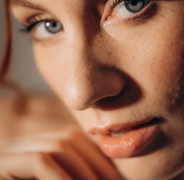 a woman with a red hair and blue eyes
