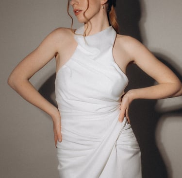 a woman in a white dress.