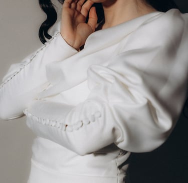 a woman in a white dress with a white dress