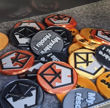 des jetons imprimés en 3D avec le logo du musée