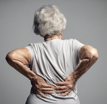 elderly female holding low back in pain