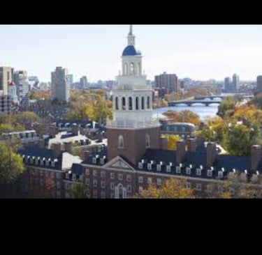 a city skyline with a clock tower in the background