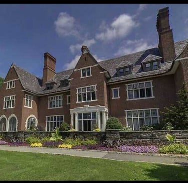 a large house with a large brick building