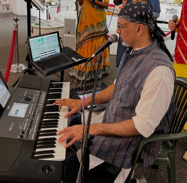 Rajan Bhai singing Garba while playing the Keyboard