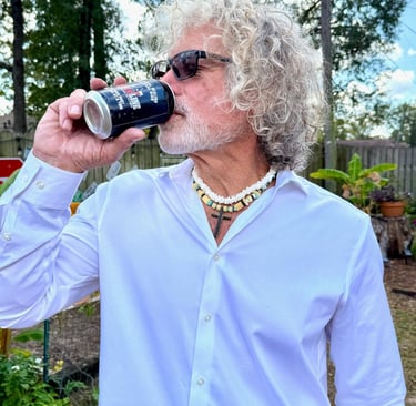 Brad Walling drinking Texas Shoreline spring water from a recyclable aluminum can
