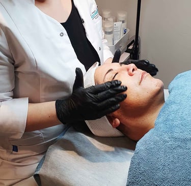 a woman is getting a facial lift 