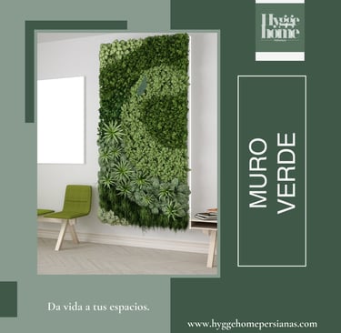 a living room with a green wall and a green chair