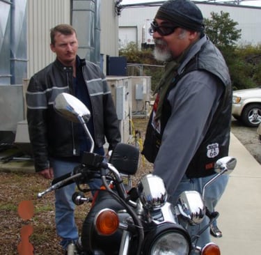 Being on the road on two wheels, drawing caricatures, is fun. But it can get real too.