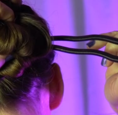 a woman is shown with a pair of scissors and scissors