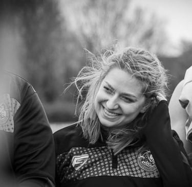 Fleur smiling post rugby match.