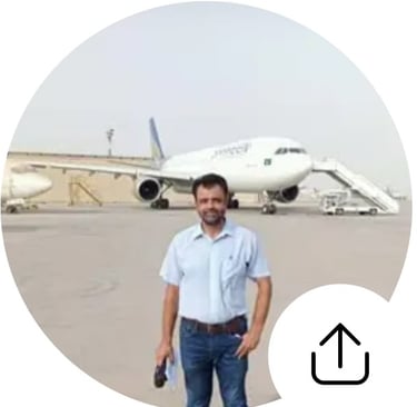faisal-bashir-standing-near-aircraft-travel-consultant