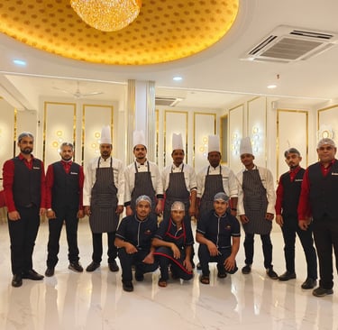 a group of chefs and their staff members