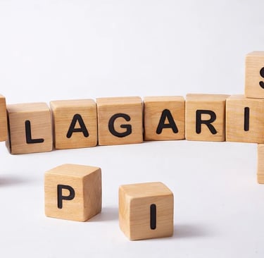 The word "PLAGIARISM" written with wooden blocks with letter left occasionally on table 
