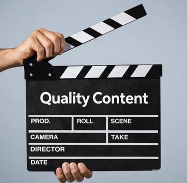 A hand holding a movie clapperboard with Quality Content text for video production and marketing.