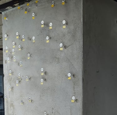 Bullet holes in one of the supporting beams of Jeonil Building 245
