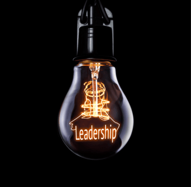 Light bulb with 'Leadership' glowing inside, symbolizing strategic vision