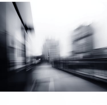 a black and white photo of a city street