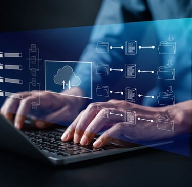 A person using a laptop computer with a cloud computing covering the topic LMS Migration Made Easy