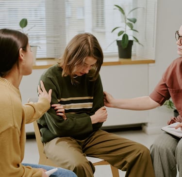 a women comforting someone