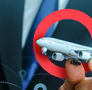 a man in a suit and tie flying an airoplane