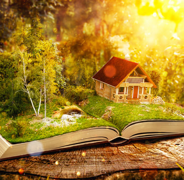 a book opened to show a house on a tree stump