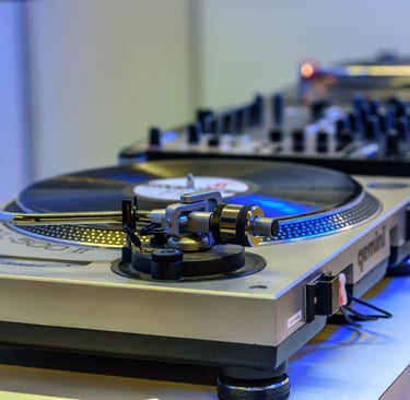 a turntable with a record player and a record player