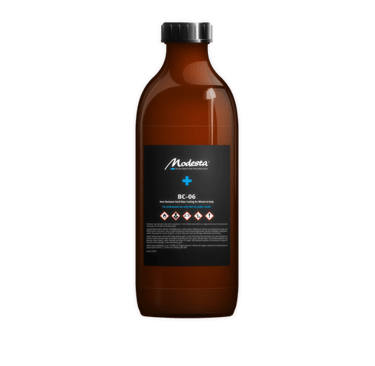 a bottle of liquid in a glass bottle