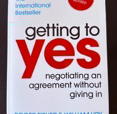 a book cover of getting to yes