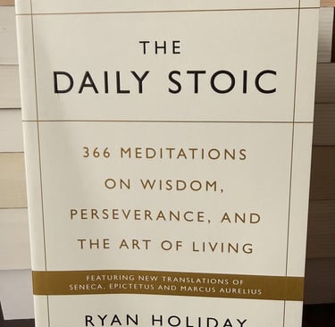 Cover of The Daily Stoic book by Ryan Holiday and Stephen Hanselman featuring 366 meditations on wisdom.