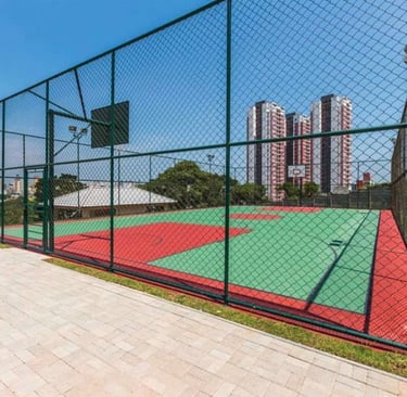 a tennis court with a basketball hoop net and a basketball hoop