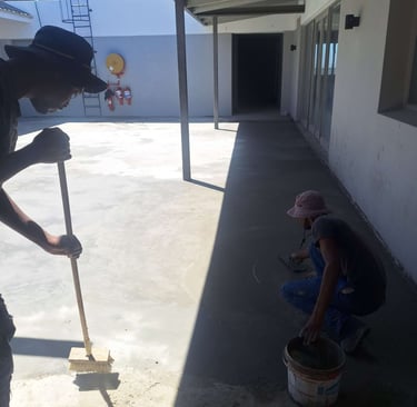 Floating surface area of specialized waterproofing screed application, Harbor Bay Mall, Simon"s Town, Cape Town