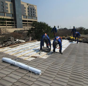 Laying roof tiles for roof installation Project, Environmental Pro Construction