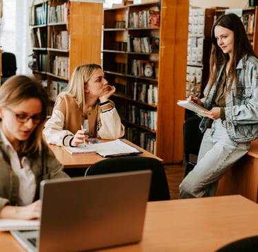 A Level Maths Online Tutoring students in a library with the right A Level mathematics resources