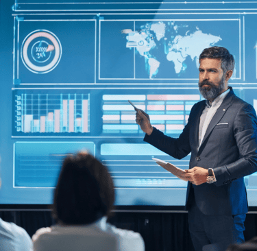 Businessman displaying interactive display product  