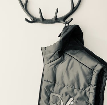 GigaVolt workwear hanging on a hook